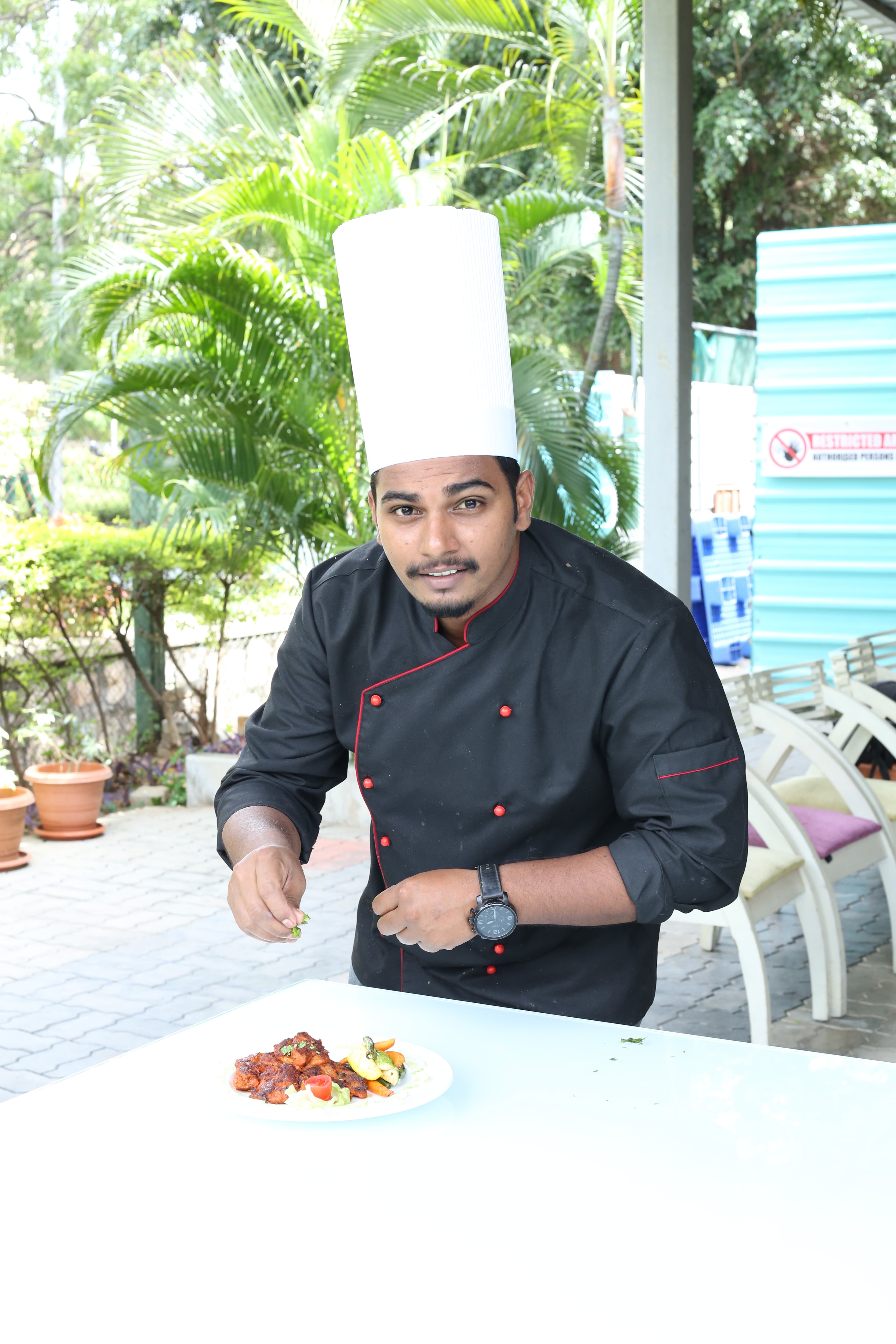 Head chef plating a dish